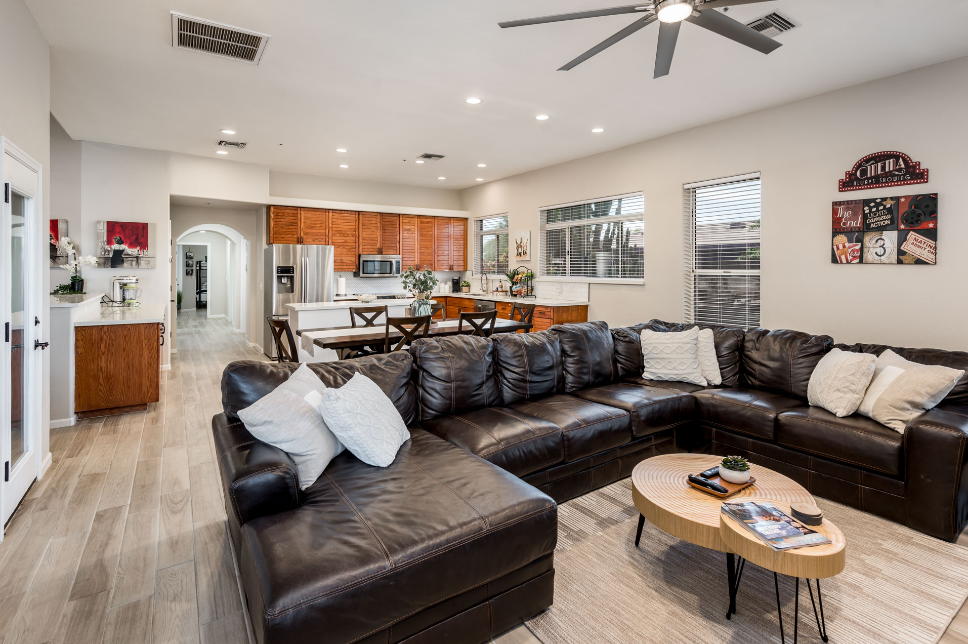 Bright living room with comfortable seating and large windows